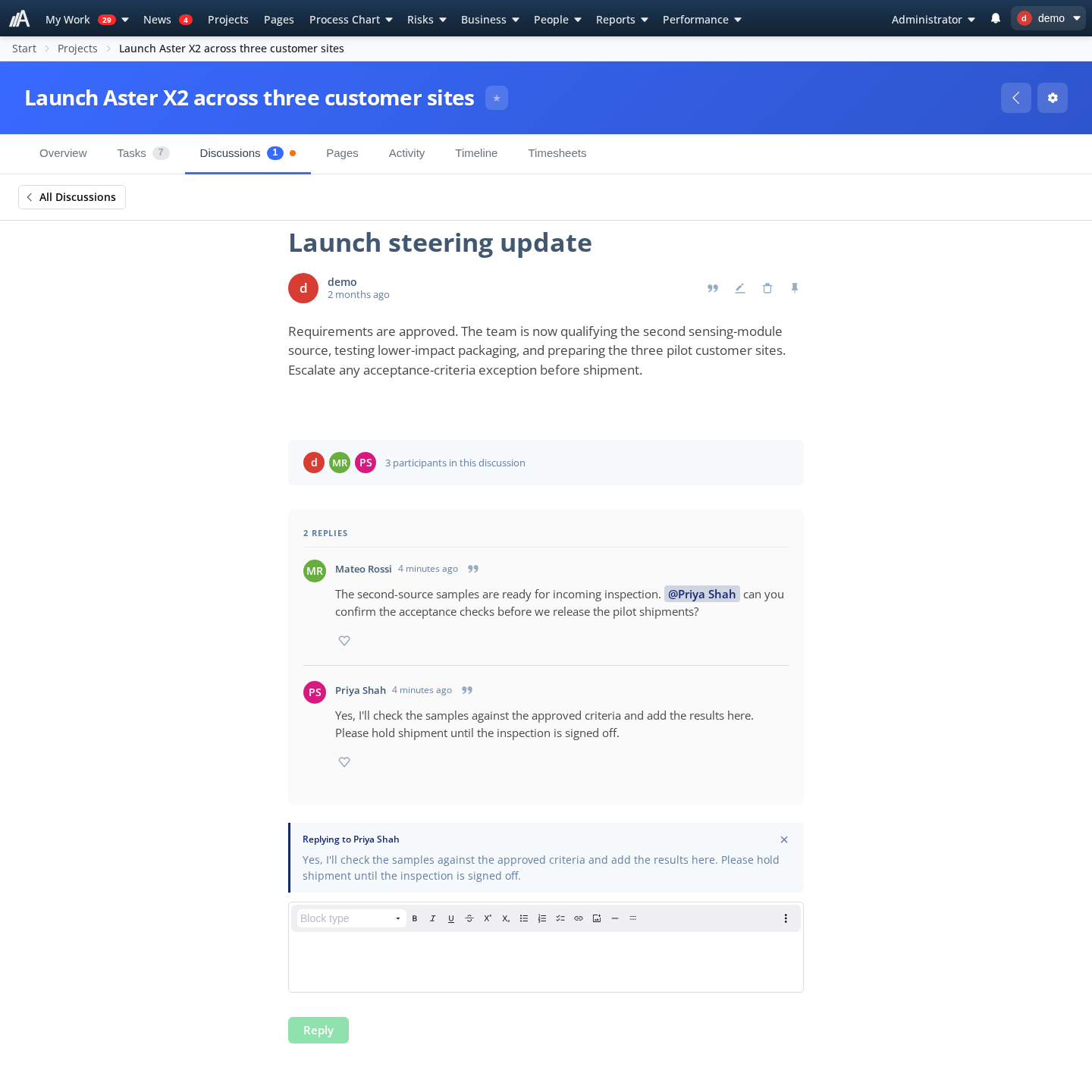 Project discussion with two comments, an @mention and a quoted reply being drafted